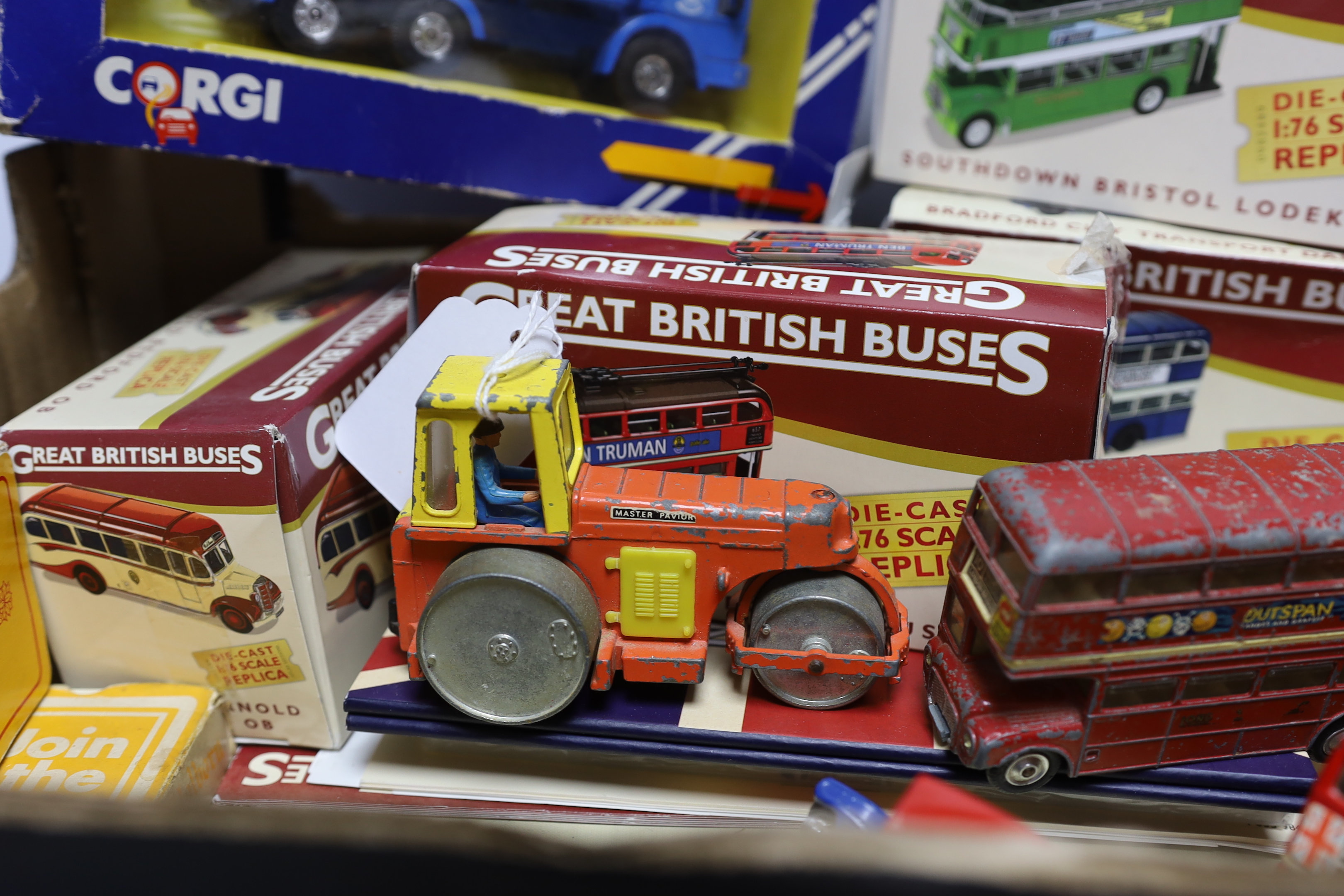 A quantity of boxed model cars, including Great British Buses, Corgi and Dinky